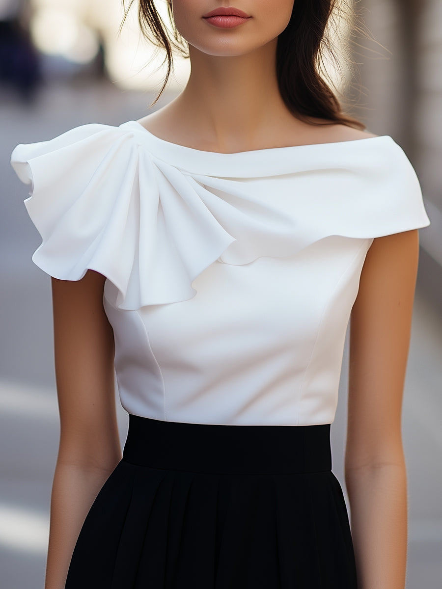 Lison | Blouse asymétrique à volant et col bateau
