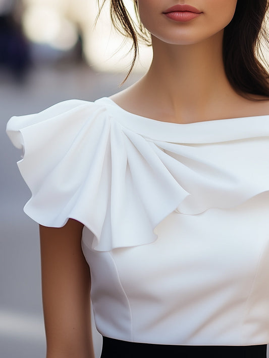 Lison | Blouse asymétrique à volant et col bateau