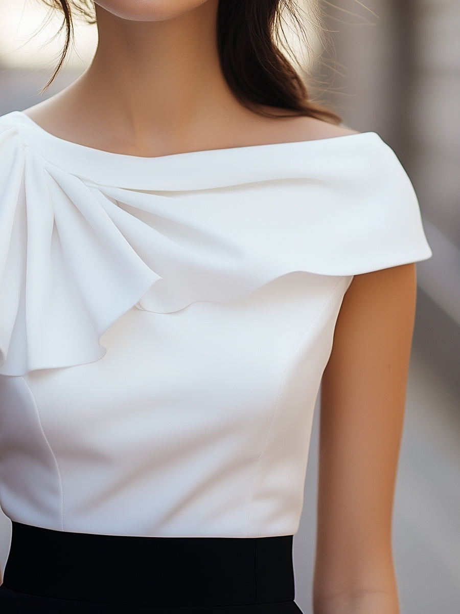 Lison | Blouse asymétrique à volant et col bateau