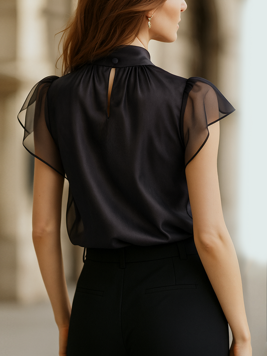 Ombeline | Blouse en mousseline noire à col montant