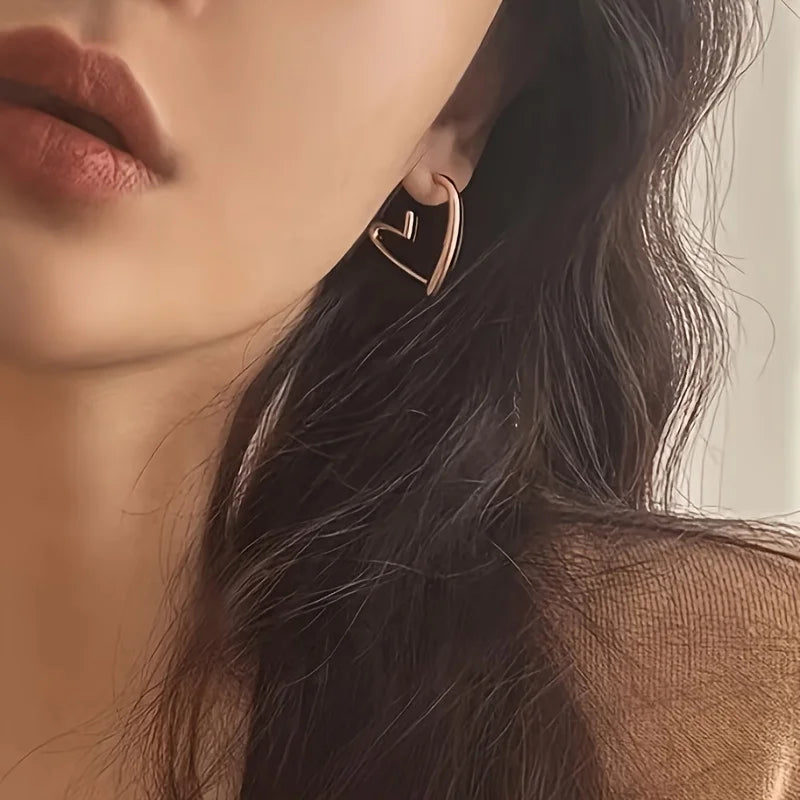 Boucles d'oreilles élégantes en forme de cœur en or rose
