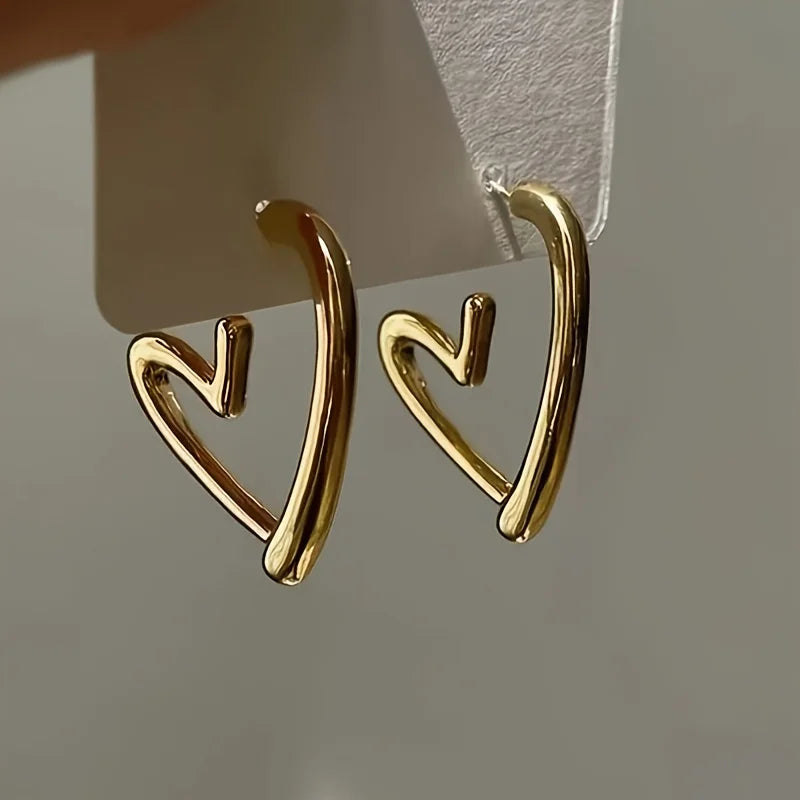Boucles d'oreilles élégantes en forme de cœur en or rose