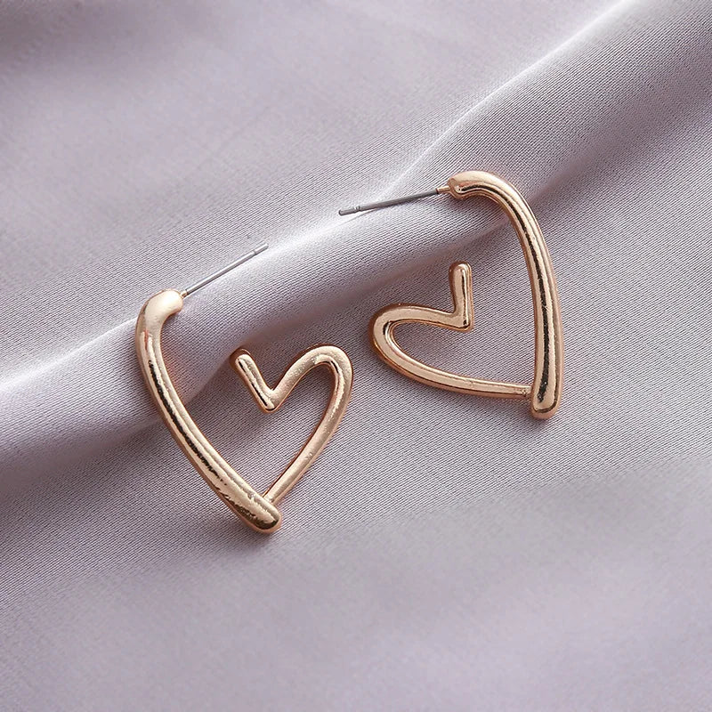 Boucles d'oreilles élégantes en forme de cœur en or rose