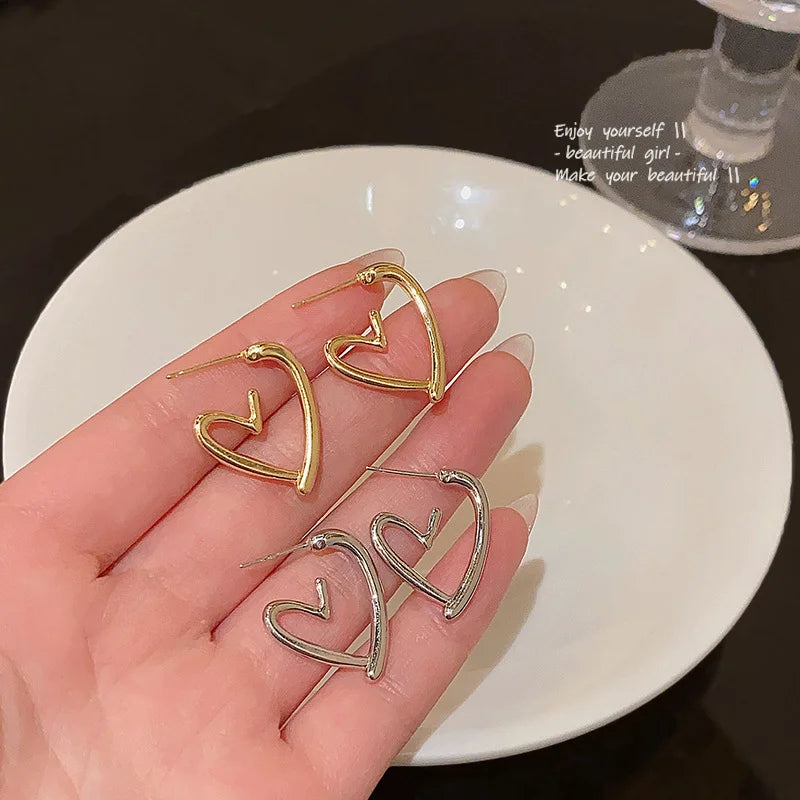 Boucles d'oreilles élégantes en forme de cœur en or rose