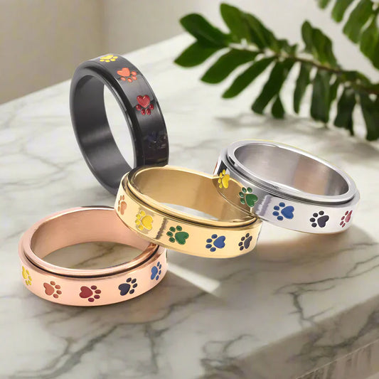 Bague Anti-Stress Rotative – Acier Inoxydable avec Pattes Arc-en-Ciel