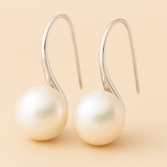 Boucles d'oreilles pendantes élégantes avec perles décoratives