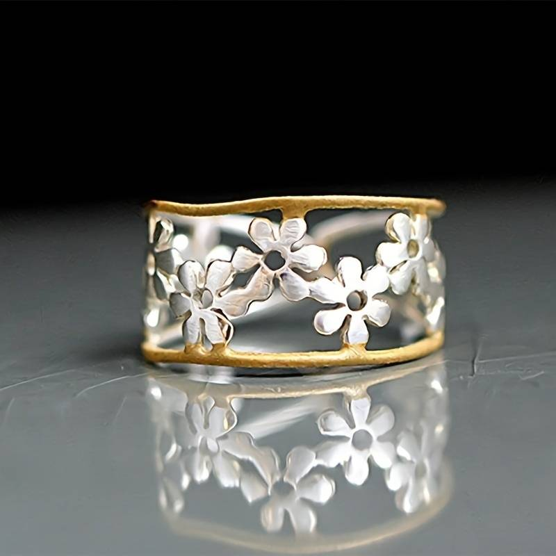 Bague marguerite irrégulière ajourée